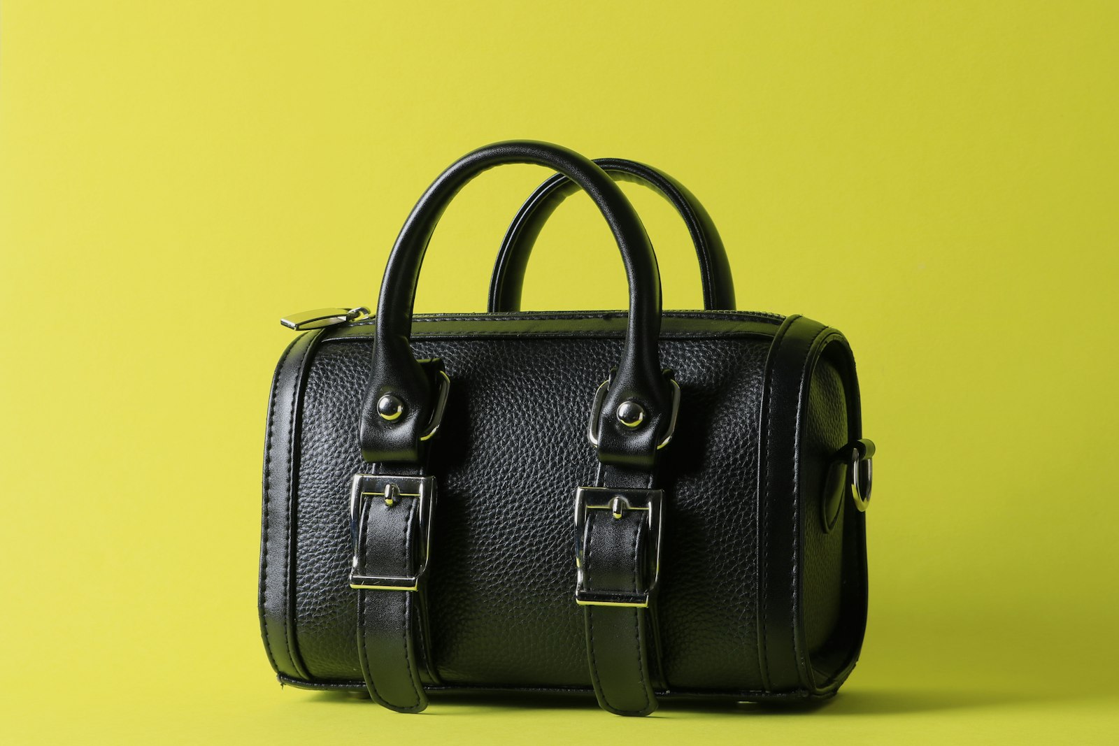 Luxe leren designertas met gouden sluiting